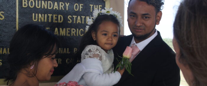 To reunite a family kept apart, a wedding on a cross-border bridge